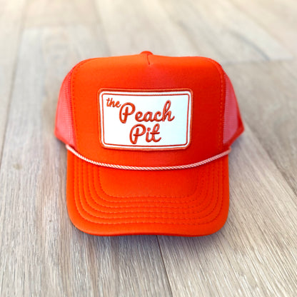 Peach Pit Trucker Hat
