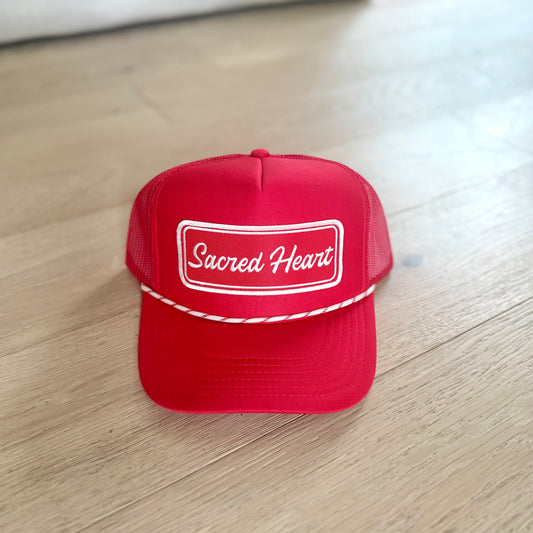“Sacred Heart” varsity trucker